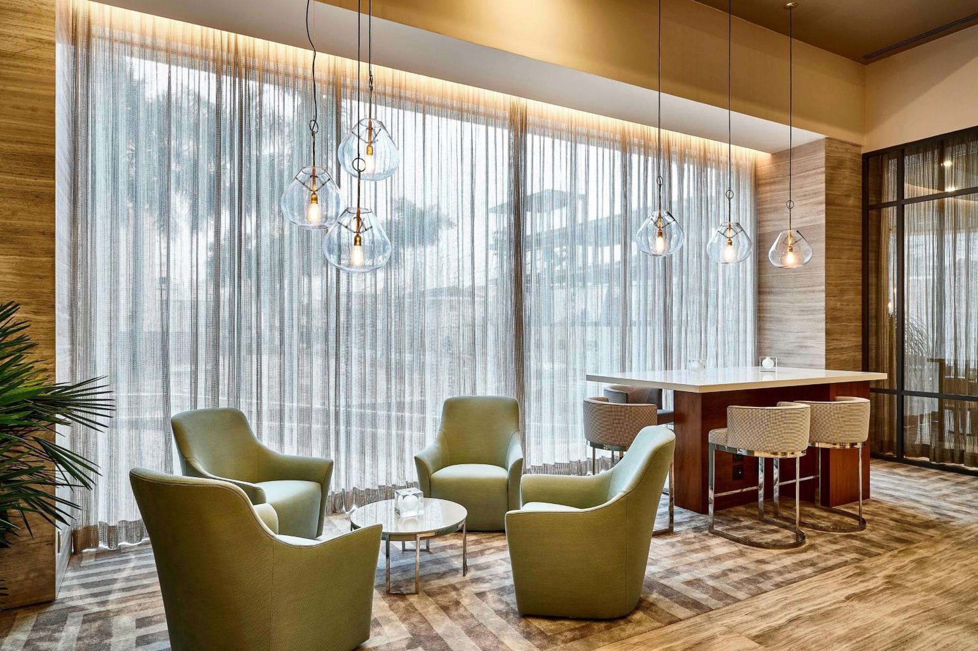 Sheraton Santos Hotel Eksteriør bilde The lounge at the airport